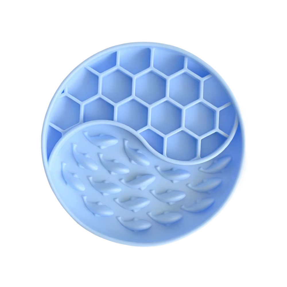 Blue silicone mold with honeycomb and leaf patterns on a white background