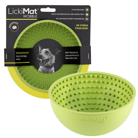 Green LickiMat Wobble dog toy with packaging on a white background