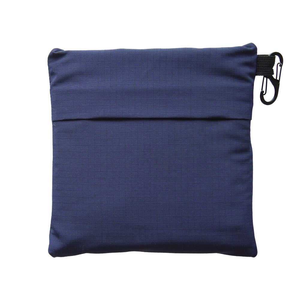 Blue SnufflePlace mat packed in pouch with a carabiner clip on a white background